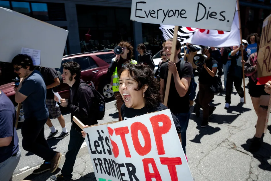 Protesters chant and carry handmade signs reading ‘Everyone Dies’ during the San Francisco anti-AI march